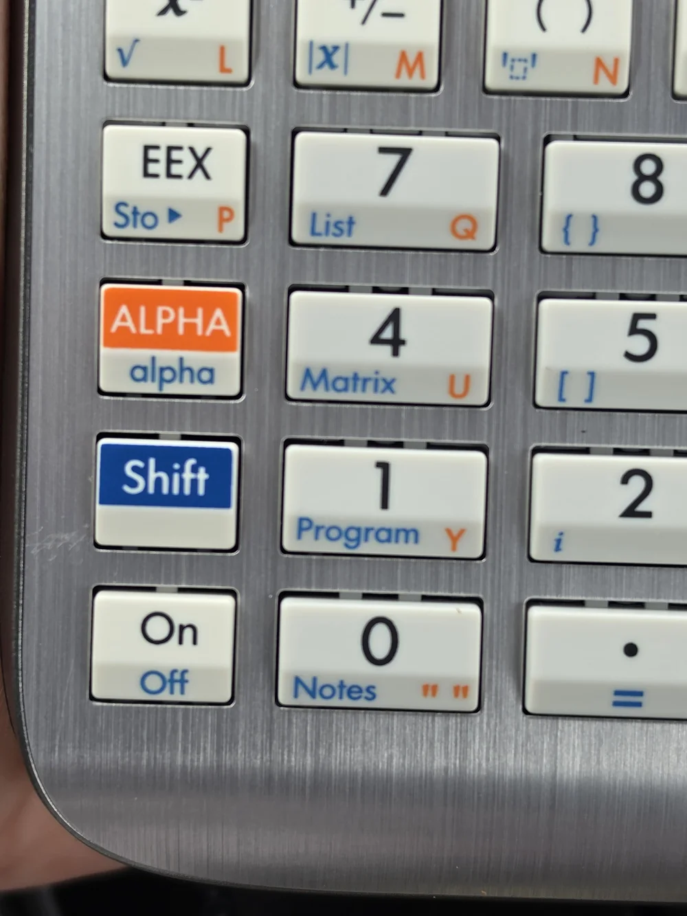 HP Graphing Calculator with Black, Gray, White, Purple, Orange, Green Interface